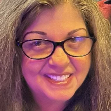 Cheri C. - Freelance Graphic Designer