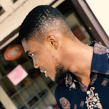 Augustine B. - Freelance Graphic Designer