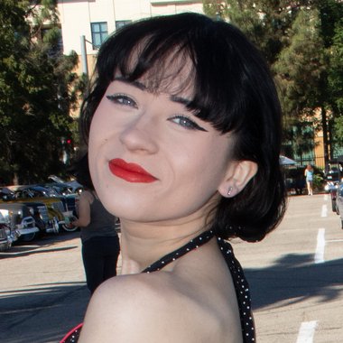 Nellie B. - Freelance Graphic Designer