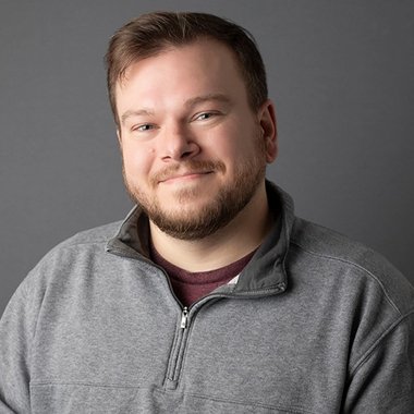 Rusty M. - Freelance Graphic Designer
