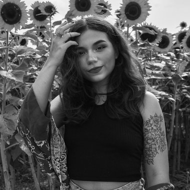 Andrea A. - Freelance Graphic Designer