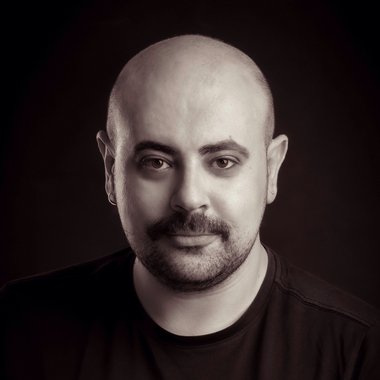 Amad H. - Freelance Graphic Designer