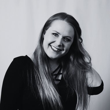 Lucy B. - Freelance Graphic Designer