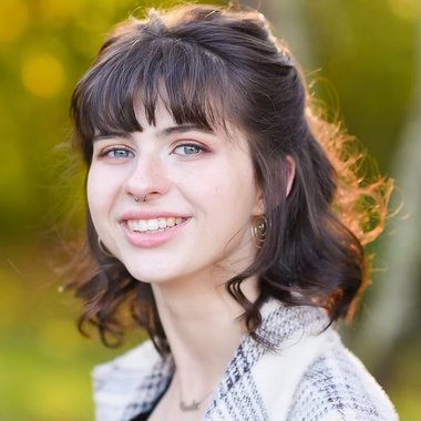 Emilie M. - Freelance Graphic Designer