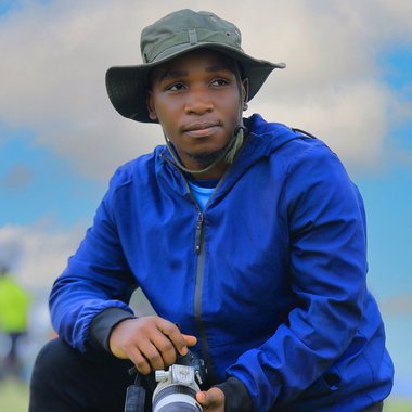 Kabuye K. - Freelance Graphic Designer