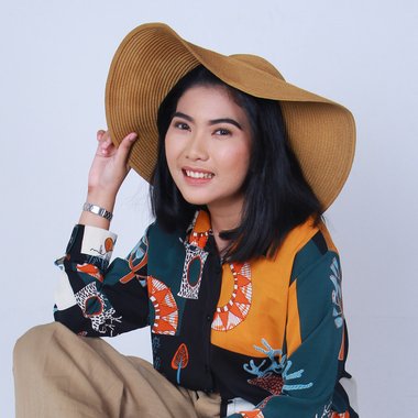 Almira B. - Freelance Web Designer