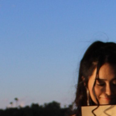 Olivia R. - Freelance Graphic Designer