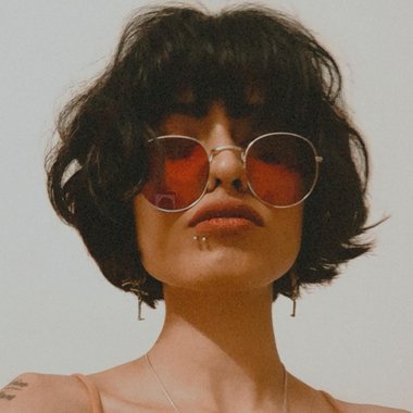 Pooja J. - Freelance Graphic Designer