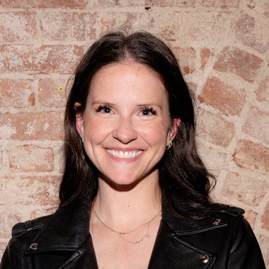 Lucy M. - Freelance Graphic Designer