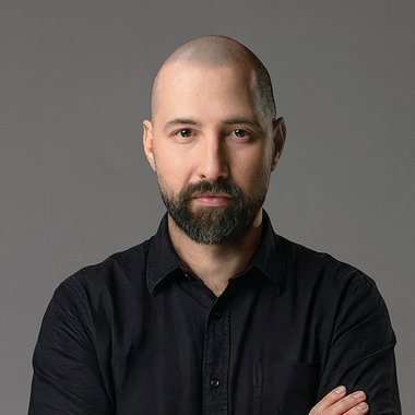 Dino A. - Freelance Graphic Designer