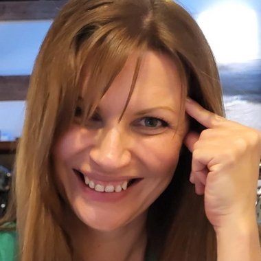 Angela D. - Freelance Graphic Designer