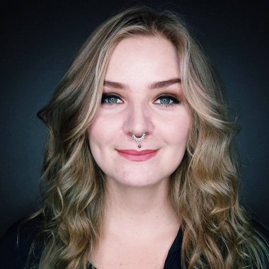 Yvonne D. - Freelance Graphic Designer