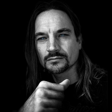 Justin M. - Freelance Graphic Designer