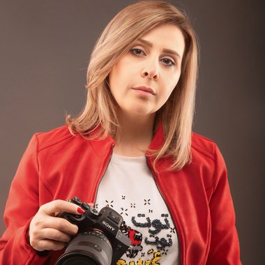 Nancy K. - Freelance Graphic Designer