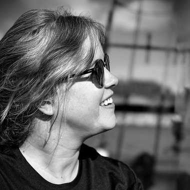 Corinne E. - Freelance Logo Designer