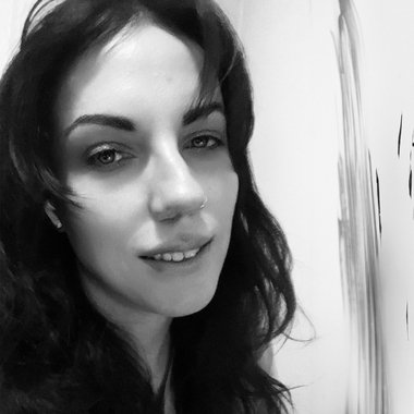 Margie A. - Freelance Graphic Designer