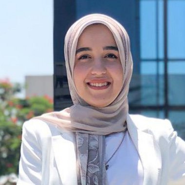 Menna K. - Freelance Graphic Designer