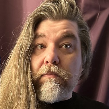 Shawn E. - Freelance Graphic Designer