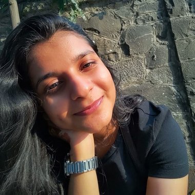 Komal G. - Freelance Graphic Designer