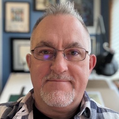 John M. - Freelance Graphic Designer