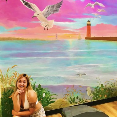 Jaci Z. - Freelance Graphic Designer