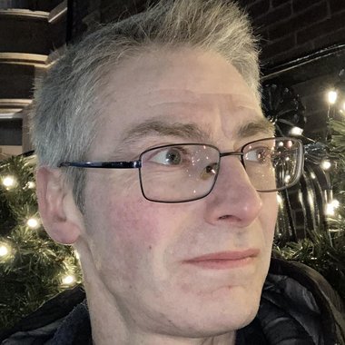 Angus M. - Freelance Graphic Designer