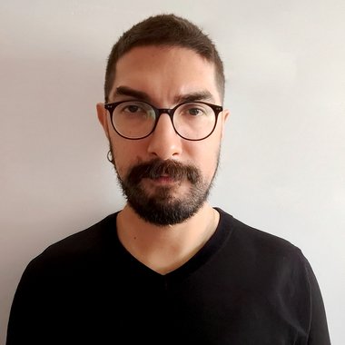 Juan R. - Freelance Graphic Designer