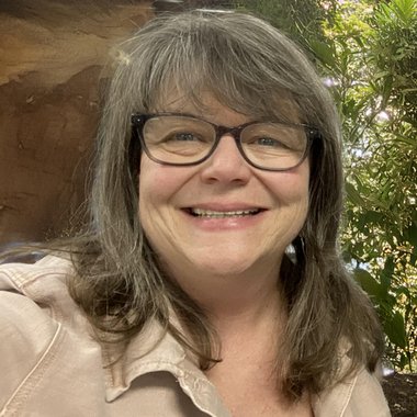 Kelly M. - Freelance Graphic Designer