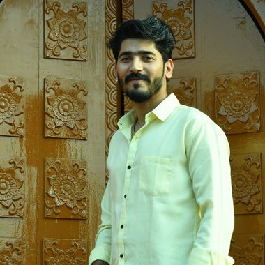Komal J. - Freelance Web Designer
