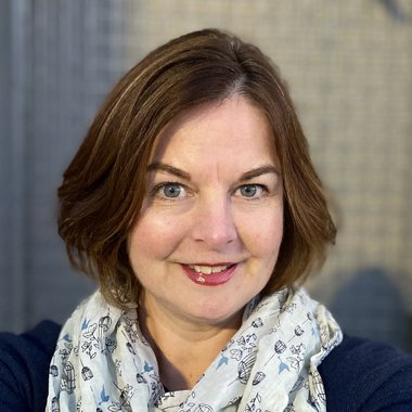 Julianne B. - Freelance Graphic Designer