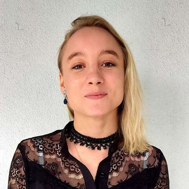 Romane B. - Freelance Graphic Designer