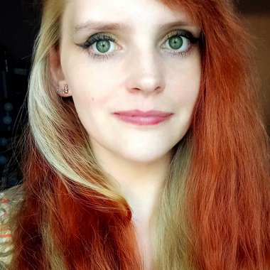 Dora C. - Freelance Graphic Designer