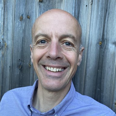 Giles P. - Freelance Graphic Designer