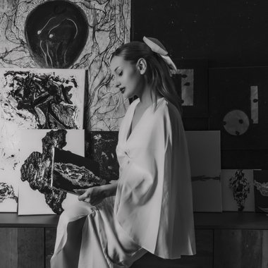 Ava B. - Freelance Graphic Designer