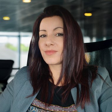 Ana K. - Freelance Graphic Designer