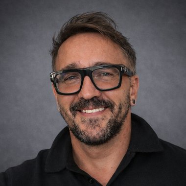 Adam D. - Freelance Graphic Designer