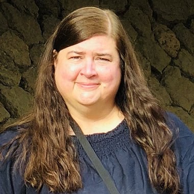 Julie A. - Freelance Graphic Designer