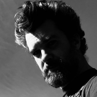 Jean-Claude C. - Freelance Graphic Designer