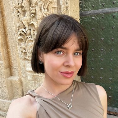 Elena D. - Freelance Graphic Designer